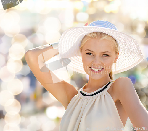 Image of beautiful woman enjoying summer outdoors