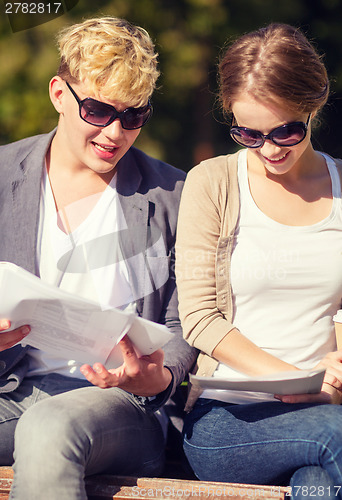 Image of two students or teenagers hanging out