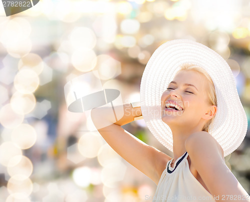 Image of beautiful woman enjoying summer outdoors