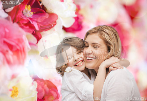 Image of happy mother and daughter hugging