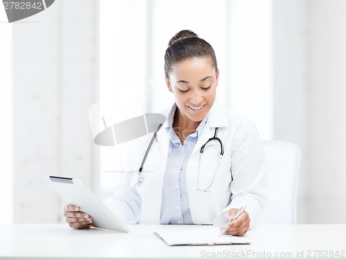 Image of female doctor with tablet pc