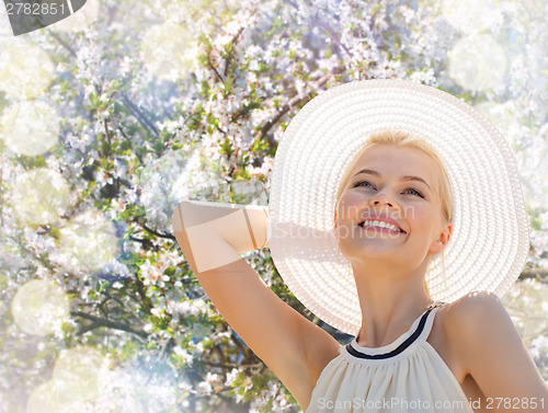 Image of beautiful woman enjoying summer outdoors