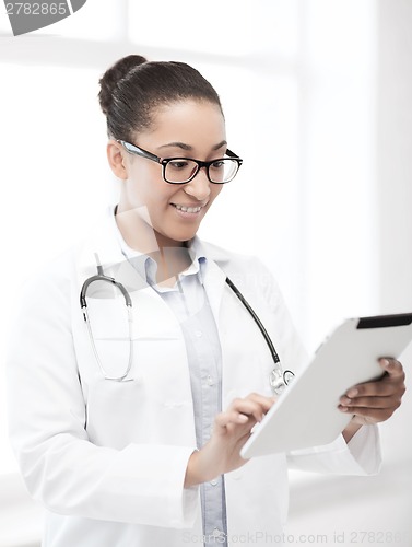 Image of african doctor with tablet pc