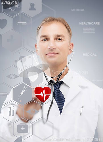 Image of male doctor with stethoscope and virtual screen