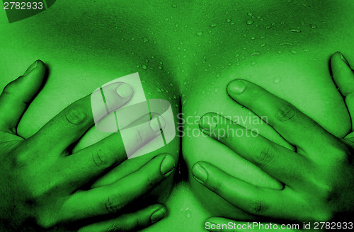 Image of Hands covering breasts