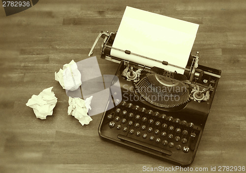 Image of Old typewriter with paper