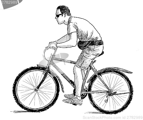 Image of man riding a bike