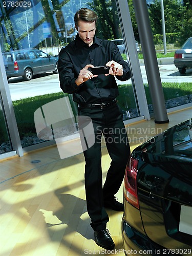 Image of photographer with camera
