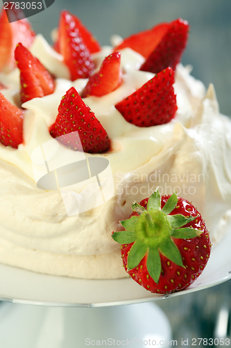 Image of Dessert with lemon cream and ripe strawberries.