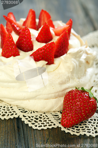 Image of Dessert with whipped cream and strawberries.