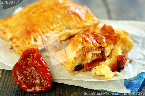 Image of Puff pastry with sun-dried tomatoes and cheese