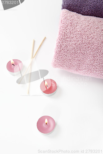 Image of Various wellness utensils in pink and purple