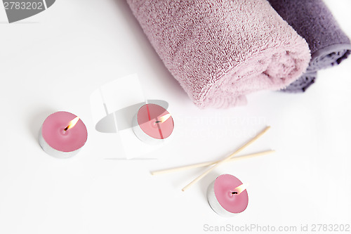 Image of Various wellness utensils in pink and purple