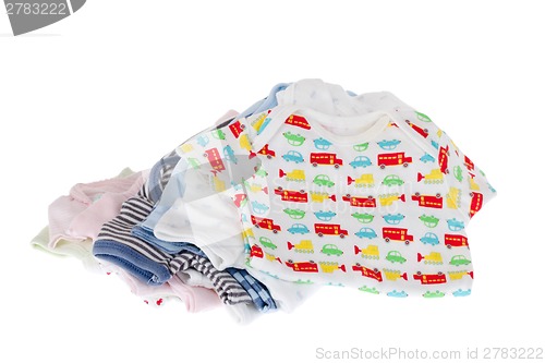Image of Pile of baby clothes isolated on white 