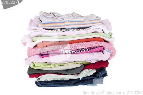 Image of Pile of baby clothes isolated on white 