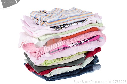 Image of Pile of baby clothes isolated on white 