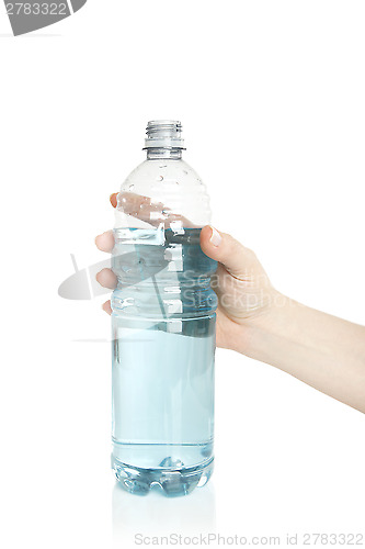 Image of Woman opens a water bottle