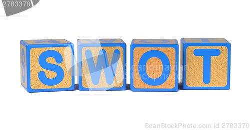 Image of SWOT on Colored Wooden Childrens Alphabet Block.