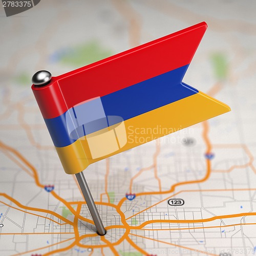 Image of Armenia Small Flag on a Map Background.