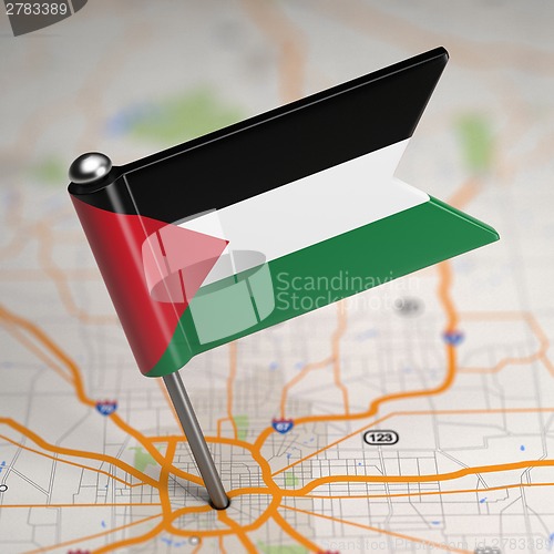 Image of Palestine Small Flag on a Map Background.