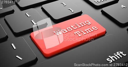 Image of Wasting Time on Red Keyboard Button.