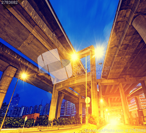 Image of City Road overpass at night with lights 