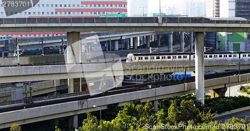 Image of Train and highway 