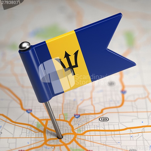 Image of Barbados Small Flag on a Map Background.