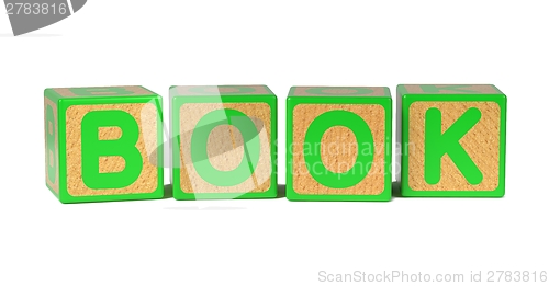 Image of Book on Colored Wooden Childrens Alphabet Block.