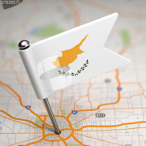 Image of Cyprus Small Flag on a Map Background.