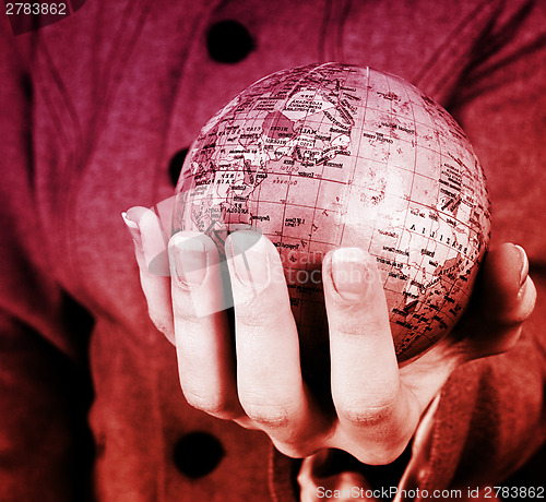 Image of Globe in a girl's hands
