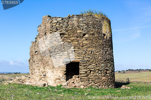 Image of Remnants of a Windmill in Field