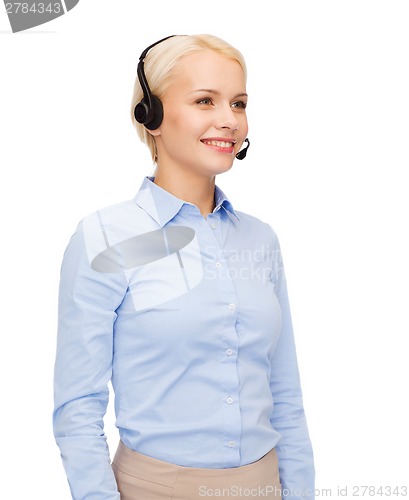 Image of friendly female helpline operator with headphones