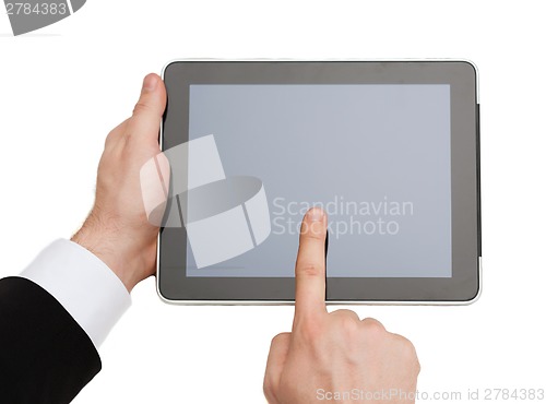 Image of close up of man hands touching tablet pc