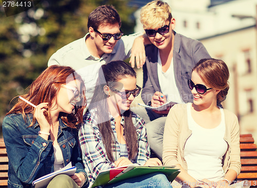 Image of group of students or teenagers hanging out