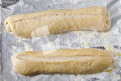 Image of Bread dough batons rising