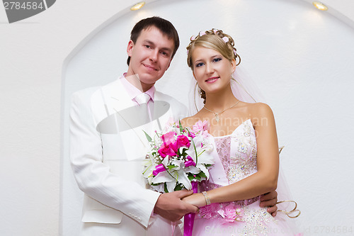 Image of wedding photo. Portrait of beautiful bride and groom