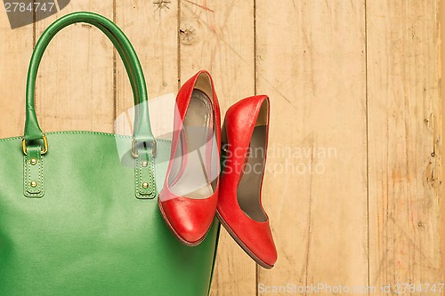 Image of Woman accessories on wood background