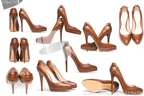 Image of elegant high heel shoes on white