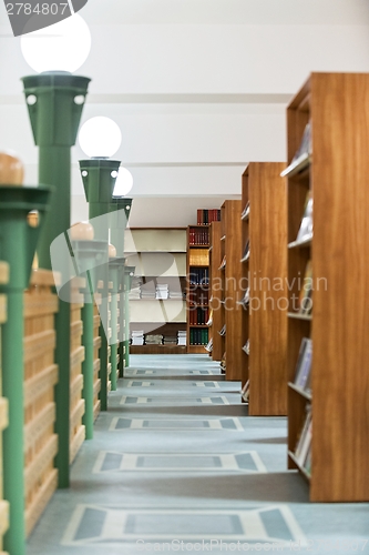 Image of Library bookshelf closeup with letter