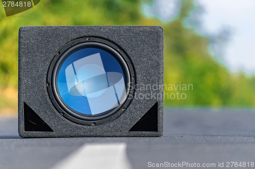 Image of Subwoofers on the road outdoors