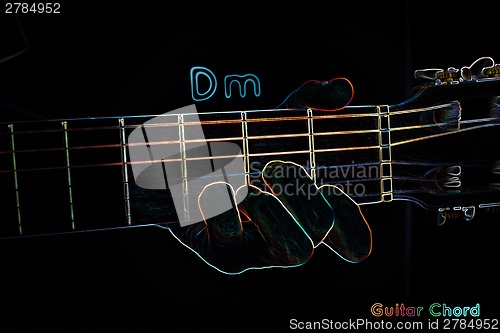Image of Guitar chord on a dark background
