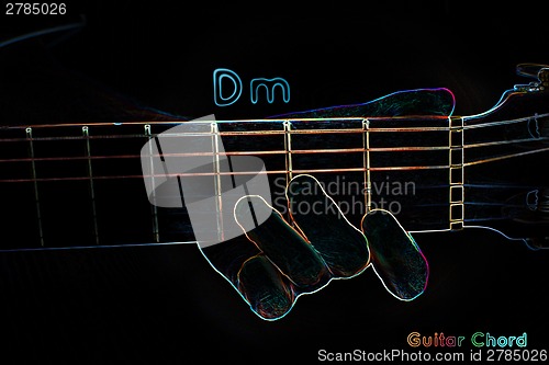 Image of Guitar chord on a dark background