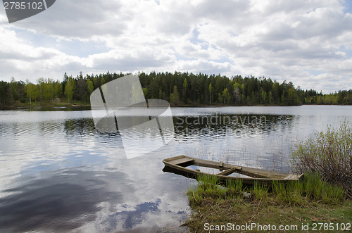 Image of Water filled rowing boat