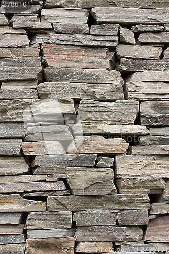 Image of Stone wall constructed from raw stones