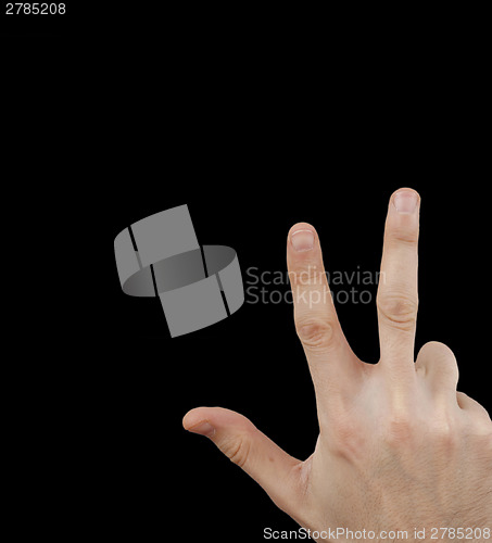 Image of White hand on black