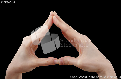 Image of White hand on black