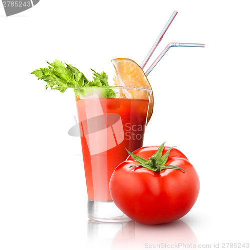 Image of red tomato and glass of juice isolated on white