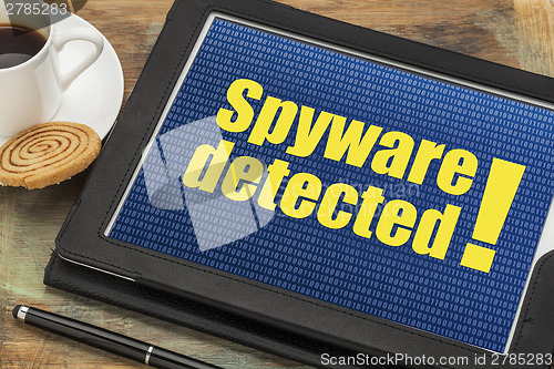 Image of spyware alert on digital tablet