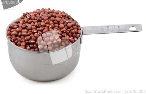 Image of Adzuki, azuki or aduki beans in an American cup measure